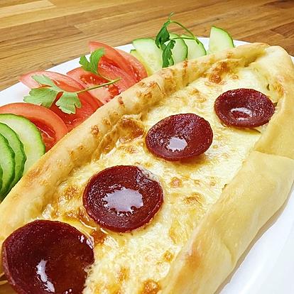 Turkish Pide with Cheese and Sucuk